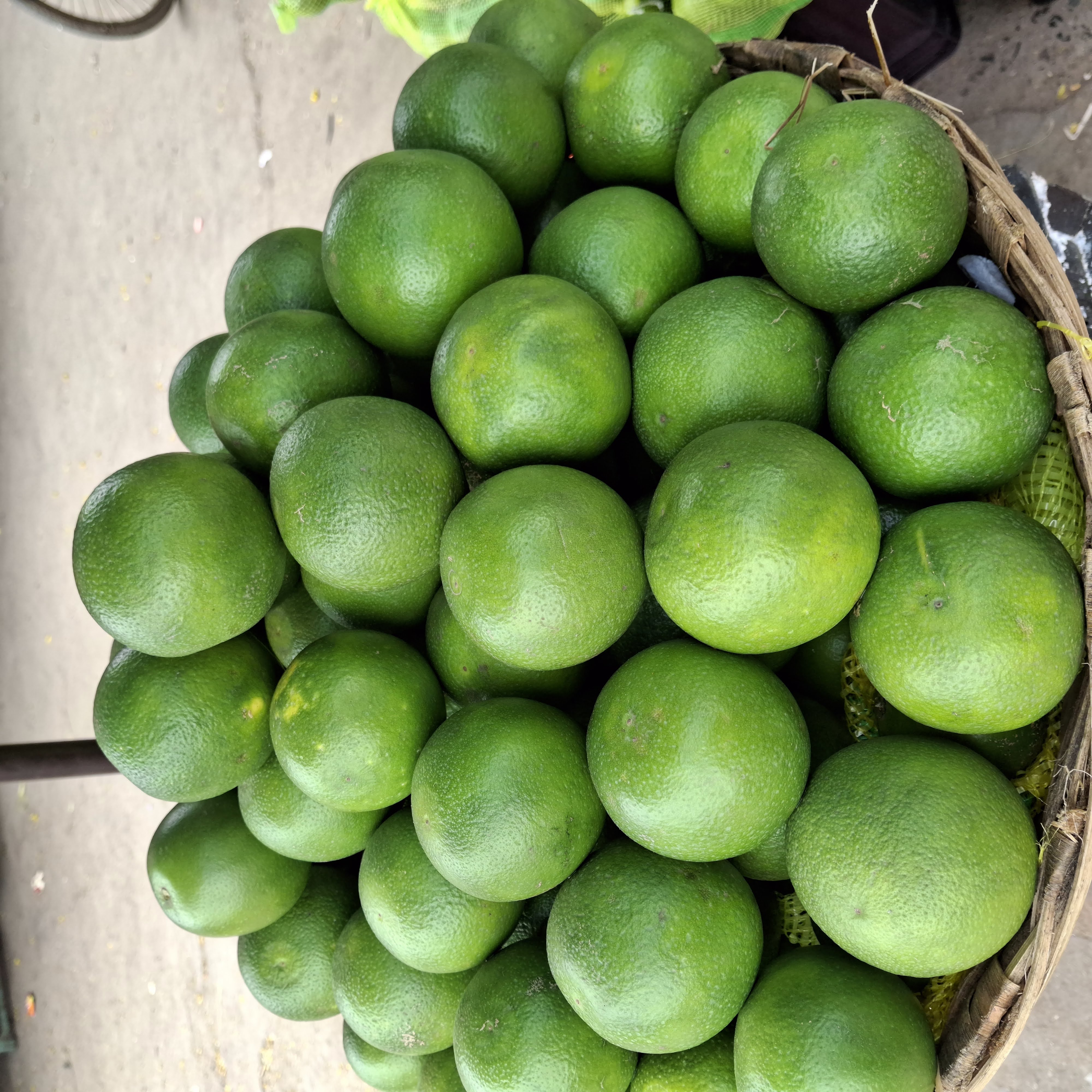 A bustling and clean fruit stall at the Udaipur Sabzi Mandi.